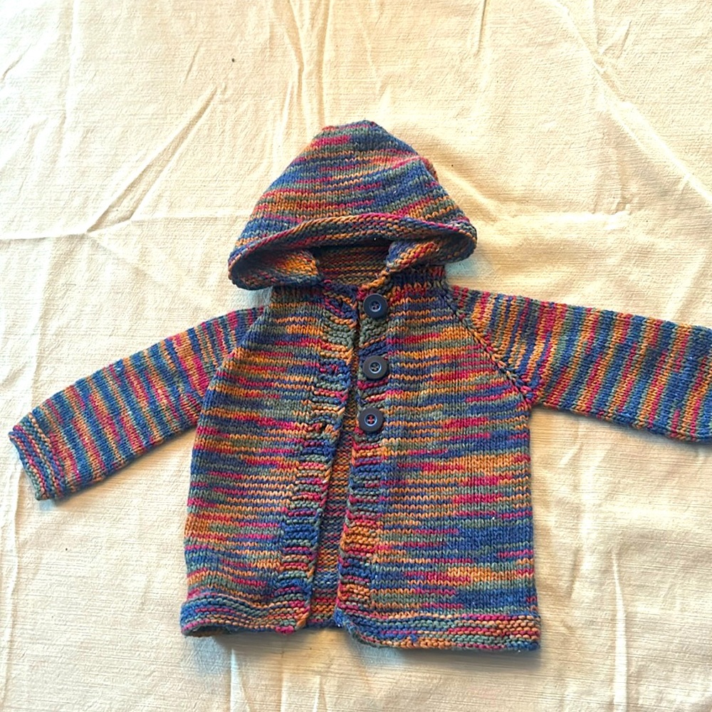 Handmade infant sweater. Brand new. Never worn